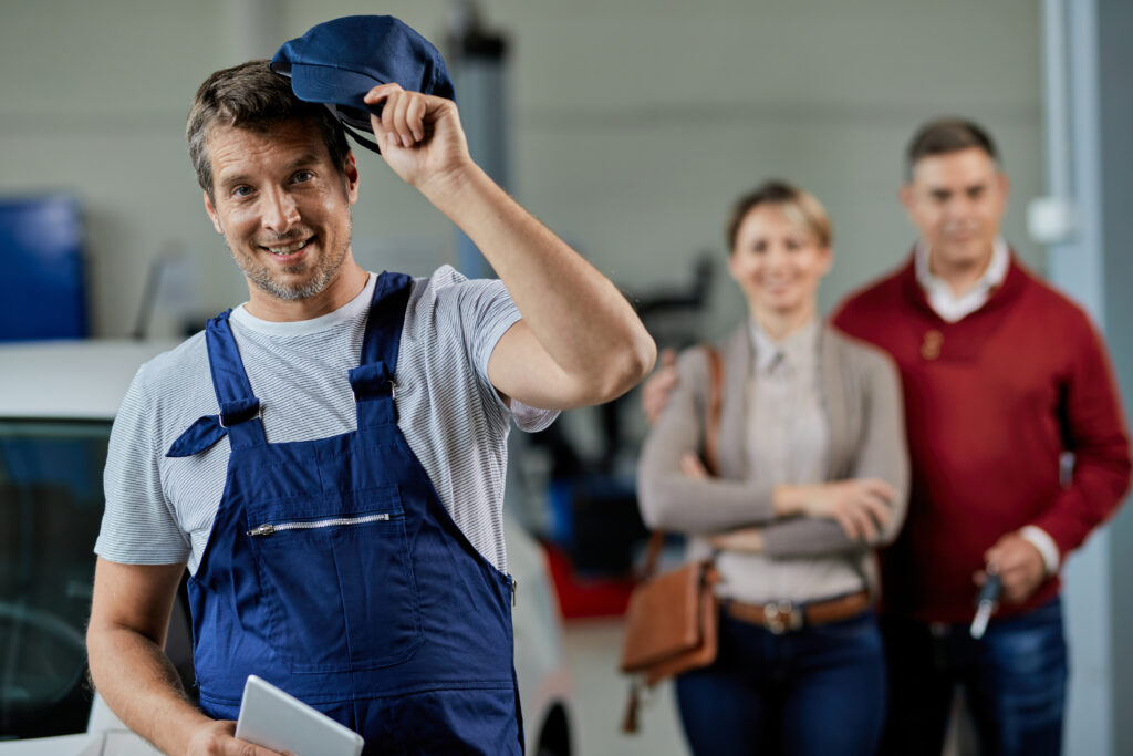 a man taking his hat off - garage door repair in london