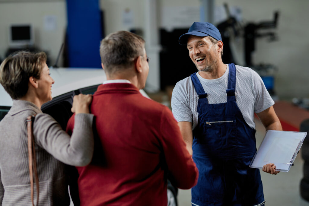 a man shaking hands with his customers - pete's garage door repair in stratford